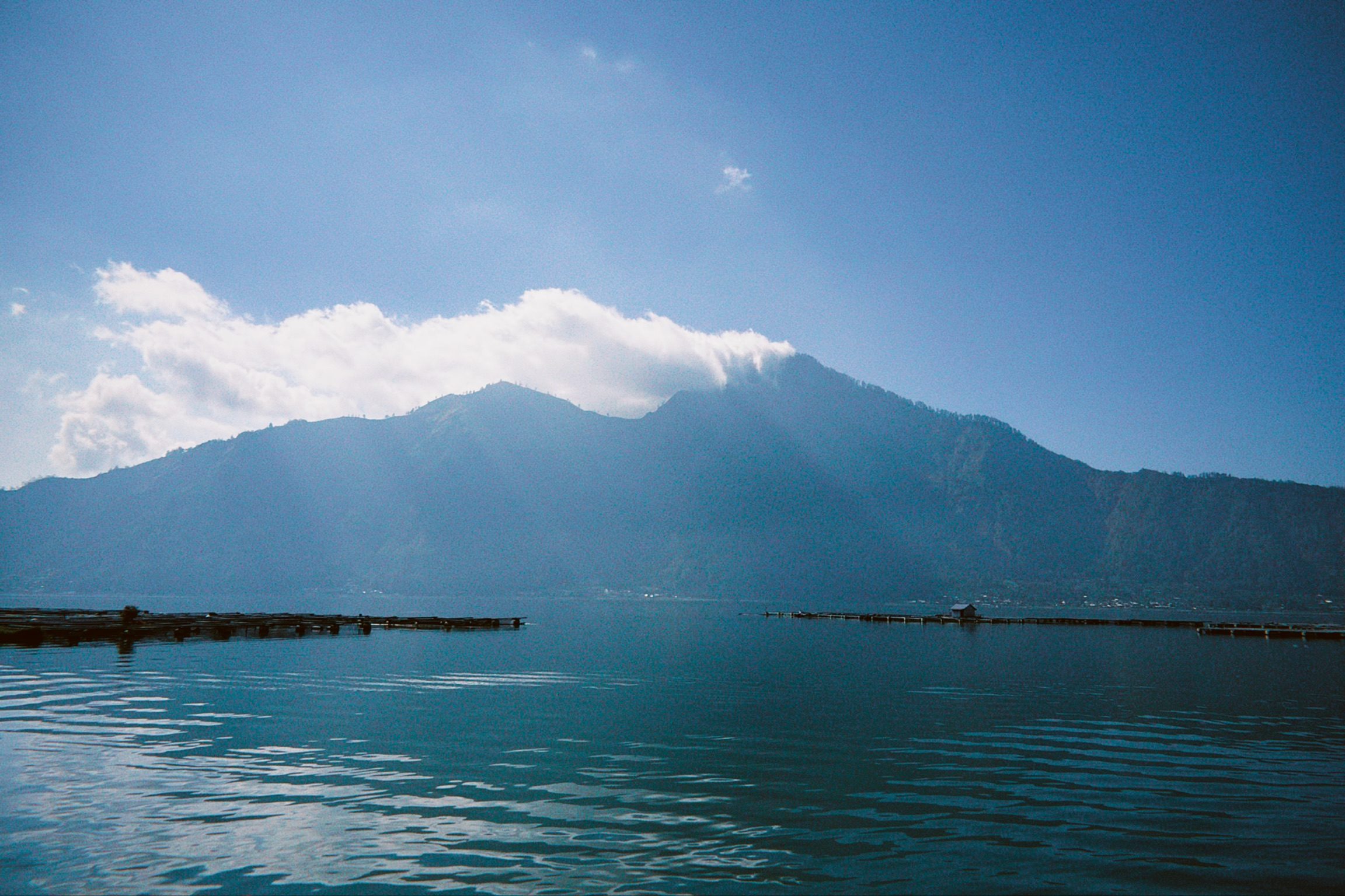 Mount Batur rising above Lake Batur, Bali
